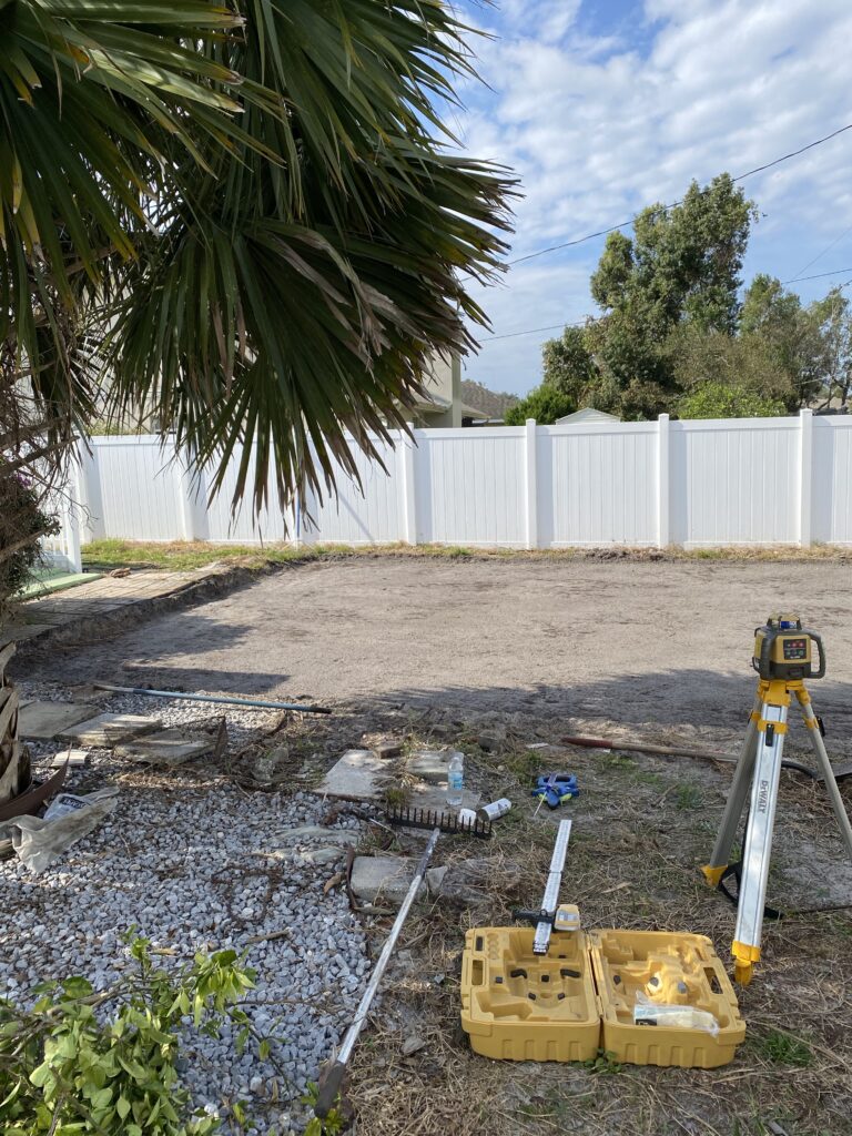 Graded backyard using a laser level for an above ground pool in Orlando