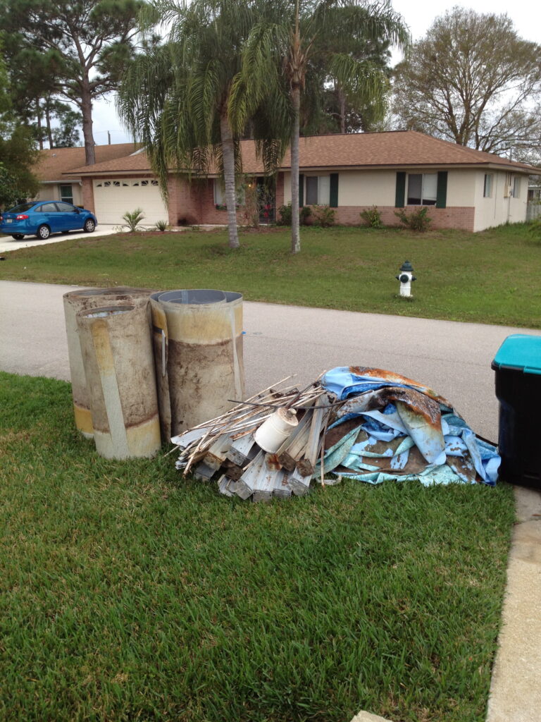 Old above ground swimming pool taken to the curb in Orlando for trash pick up